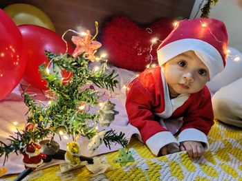 Portrait of cute girl with christmas decoration