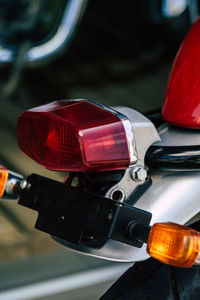 Close-up of red vintage car