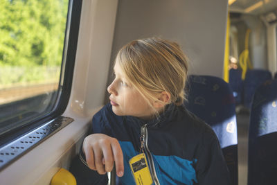 Girl sitting in bus