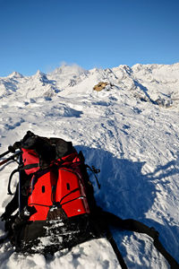 Snow covered mountains against sky