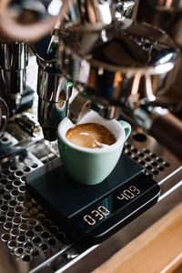 Coffee cup on table in cafe