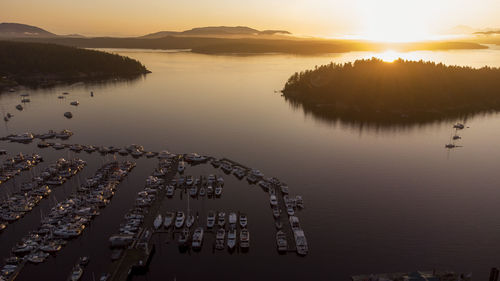 High angle view of harbor at sunset