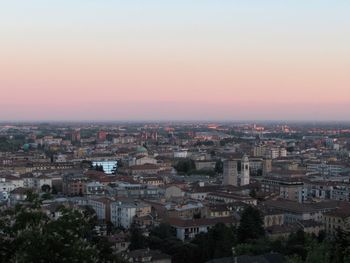 Aerial view of cityscape against sky