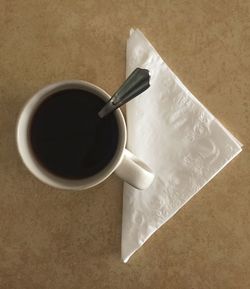 Close-up of coffee cup on table