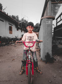 Full length portrait of boy smiling