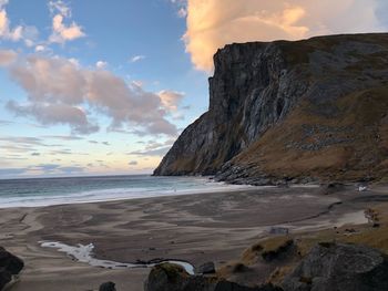 Scenic view of beach against sky during sunset