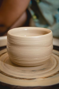 Close-up of coffee cup on table