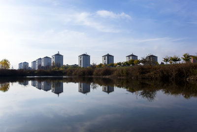 
palaces reflected in the lake in italy