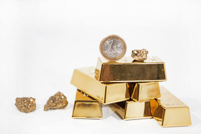 Close-up of coins on white background