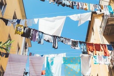 Low angle view of clothes hanging on clothesline