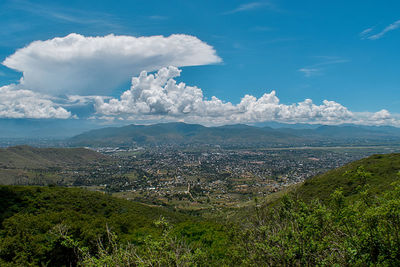 Aerial view of townscape against sky