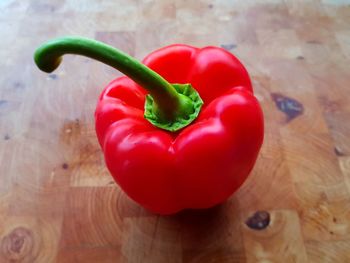 Close-up of red bell peppers on table