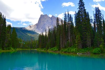 Scenic view of emerald lake against mountains