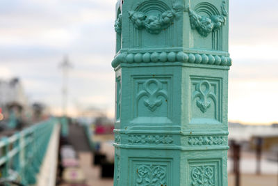 Close-up of statue against cloudy sky