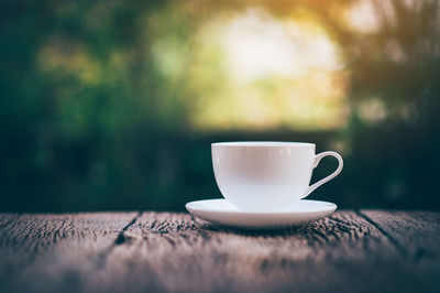 Close-up of coffee cup on table