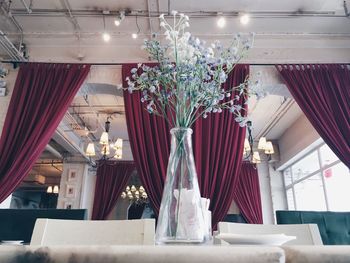 Close-up of vase on table at restaurant