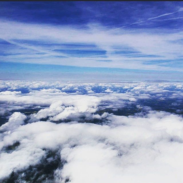 scenics, beauty in nature, tranquil scene, tranquility, sky, snow, nature, winter, cloud - sky, cold temperature, weather, mountain, white color, blue, aerial view, idyllic, cloudscape, majestic, landscape, cloud