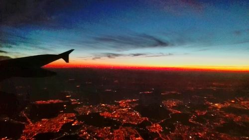 Aerial view of landscape against sky during sunset