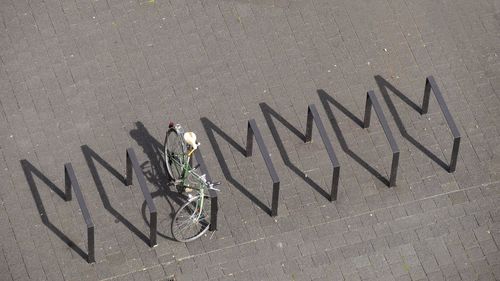 High angle view of bicycle parked on street