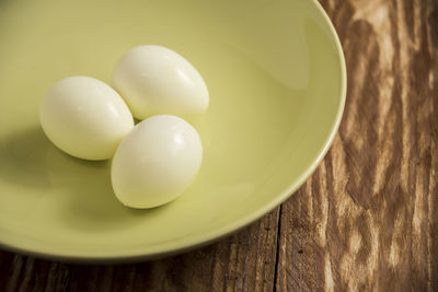 High angle view of eggs in bowl on table