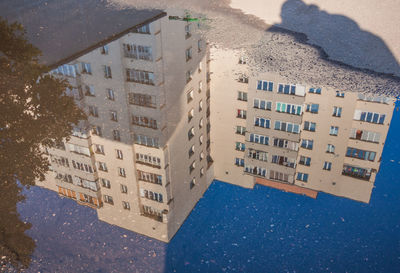 High angle view of buildings against sky