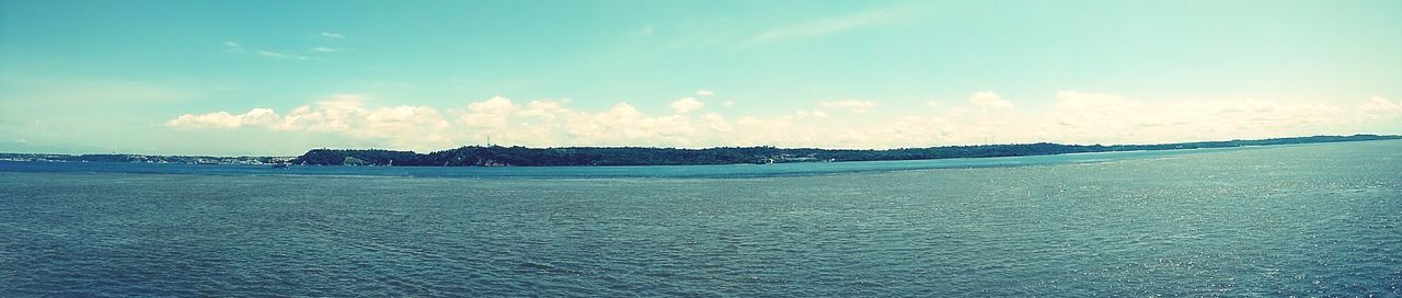 sea, water, tranquil scene, sky, tranquility, scenics, beauty in nature, beach, nature, blue, horizon over water, waterfront, idyllic, cloud - sky, sand, shore, cloud, coastline, outdoors, remote