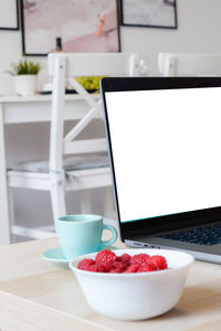 Close-up of laptop on table