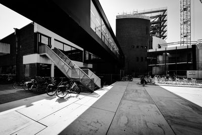 Street amidst buildings in city against sky