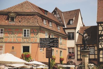 Houses against sky in town