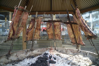 Clothes drying on barbecue grill