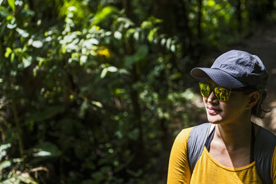 Woman exploring the waterfall in mindo, pichincha, ecuador