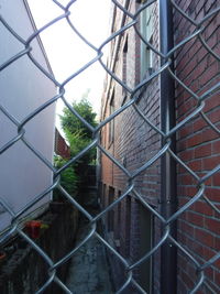 Fence seen through chainlink fence