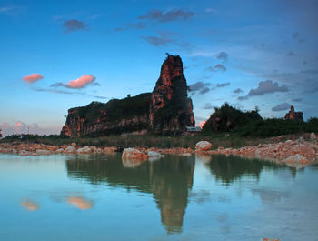 Scenic view of rock formation against sky