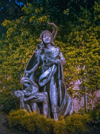 Statue of angel in park