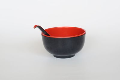 High angle view of tea cup against white background