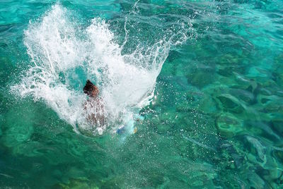 High angle view of person swimming in sea