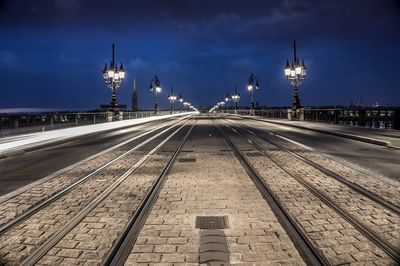 Tramway on a bridge at night