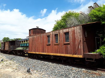 Train on railroad track against sky