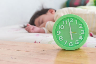 Portrait of a boy sleeping on bed