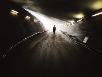 People walking in tunnel