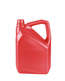 Close-up of red bottle against white background
