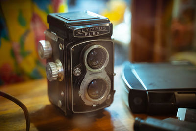 Close-up of camera on table