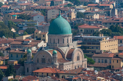 Aerial view of synagogue and museum building with green dome in florence, italy