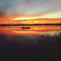 Dramatic sky over calm lake