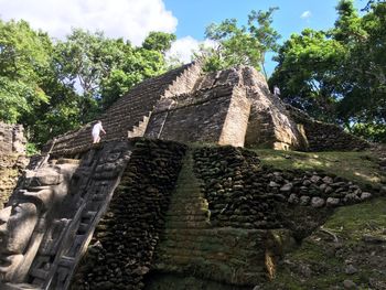 Low angle view of old building against sky