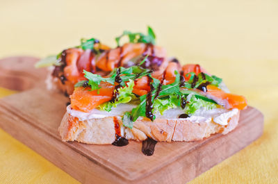 Close-up of fish served on table