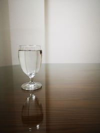 Close-up of wine glass on table