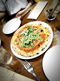 High angle view of pizza on table