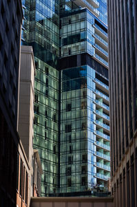 Low angle view of modern buildings in city