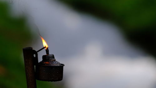 Close-up of burning candle